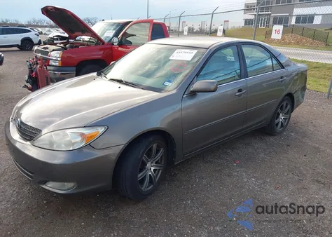 2004 Toyota Camry Xle z USA, uszkodzony, nr VIN 4T1BE32K24U802120